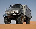 Unimog S404 used as mobile home in the Dunes of Erg Chebbi in Morocco. Note the high ground clearance due to portal gear axles