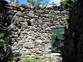 Old castle gate on the west. It once led to a wooden platform, but now leads to a sheer drop