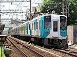 1002F minapitaラッピング （2006年7月 帝塚山駅付近）