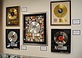 Image 27Platinum records by Elvis Presley, Prince, Madonna, Lynyrd Skynyrd, and Bruce Springsteen, at Julien's Auctions (from Album era)
