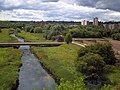 The Tame at Ray Hall sewage works, from the Tame Valley Canal aqueduct, with the Charlemont area of West Bromwich on the right.