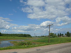 The Vekhsa River and the village of Uspolon in Shimsky District