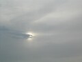 Sol escondido sob Altostratus