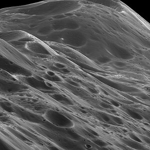 Iapetian equatorial ridge, by NASA/JPL/Space Science Institute