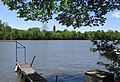 Photo looking southeast across the Kankakee River from Kankakee, Illinois near Cobb Park. The clocktower of the Shapiro Developmental Center can be seen in the background.