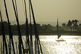 Sunset on Nile River in Luxor, Feluccas
