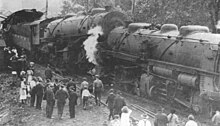 Mallet locomotives 716 and 729 on the southbound track after the twenty mile per hour collision. A conductor had just stepped out of a trackside phone booth when the train hit it. A passing train was just barely caught before it would have hit the wreckage.