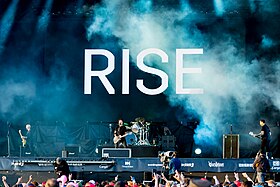 Rise Against at Rock am Ring 2023. Left to right: Zach Blair, Tim McIlrath, Brandon Barnes (drums), and Joe Principe
