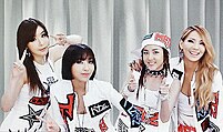 2NE1 smiling for the camera