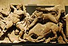 a sculpture of Greek figures
