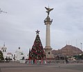 The Angel and the Plaza Mayor during Christmas, with San Francisco Temple in the background.