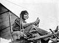 Image 7 Hélène Dutrieu Photo credit: Bain News Service Hélène Dutrieu, shown here in her aeroplane ca. 1911, was the fourth woman in the world (the first from Belgium) to earn a pilot's license and reputedly the first woman to carry passengers and to fly a seaplane. Besides being a pilot, she was a cycling world champion, stunt cyclist, stunt motorcyclist, automobile racer, wartime ambulance driver, and director of a military hospital. More selected pictures