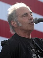Nils Lofgren performing in 2019
