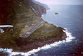 Saba's airport on Flat Point, with road winding up through Lower Hell's Gate