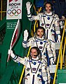 Soyuz TMA-11M crew members with the 2014 Olympic torch