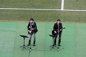 Yuzu performing in 2012. From left to right: Yūjin Kitagawa, Kōji Iwasawa