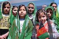Afghan children with the national flag in Badghis Province