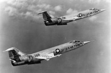 Two F-104s flying in formation