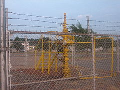 A natural gas well in front of the Frank Anthony Center in Springhill
