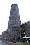 Windmill, adjoining barns, gatehouse and curtain wall