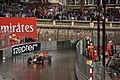 Daniel Ricciardo passing Zepter branding at the 2016 Monaco Grand Prix