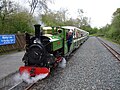 Image 24Ruislip Lido Railway's 12-inch (300 mm) gauge locomotive "Mad Bess" hauling a passenger train.