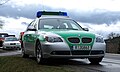 BY Streifenwagen BMW 5er in grün-silberner Farbgebung