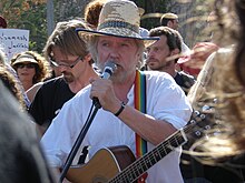 Tommy Sands performs in a joint Israeli-Palestinian demonstration in Sheikh Jarrah against house evictions of Palestinians by Israeli courts.