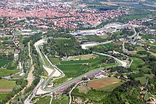 The circuit is located in parkland on the outskirts of the town of Imola.