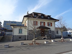 Three-story building with hip roof