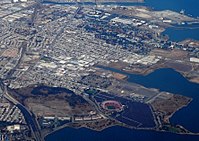 A bird's-eye view of the Bayview–Hunters Point neighborhood of San Francisco. Candlestick Park, demolished in 2015, is in the foreground.