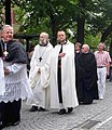 Procession of the Holy Blood in Bruges: abbott Van Hecke (second to the left) with one of his monks