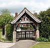 Lychgate with stone base and timber frame