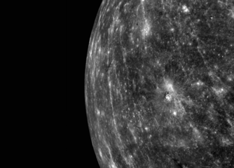 View of Mercury's limb at a high sun angle, with Warhol as the bright crater near center