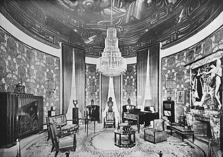 סלון של Hôtel du Collectionneur מהתערוכה הבינלאומית לאמנויות דקורטיביות משנת 1925, מרוהט על ידי אמיל-ז'אק רולמן, ציור מאת ז'אן דופאס, עיצוב על ידי פייר פטו.