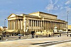 St George's Hall, long neo-classical building with multiple portico sets.