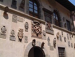The Medici coat of arms of the façade of the Palazzo dei Capitani.