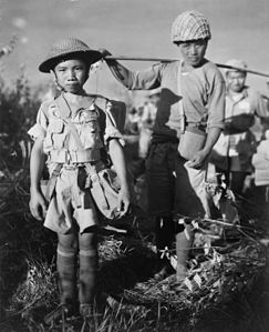Chinese child soldier, by the Signal Corps (edited by Beao)