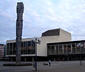 Pfalzbau concert hall and theater. In the foreground: "Pfalzsäule" (Palatinate Column, 1968), by the Munich artist Blasius Spreng and the local artist Ernst W. Kunz.