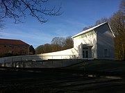 The Maison forestière Wilfred-Owen (2011) by Simon Patterson, dedicated to Wilfred Owen, commissionned by the mayor and inhabitants of the town of Ors (France).