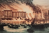 Burning buildings on the River Thames.