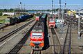 Freight trains driven by electric locomotives VL10 and 2ES10, fire train, depot buildings