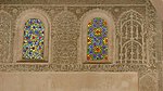 Coloured glass windows above in the prayer hall, with stucco grilles and surrounding stucco decoration