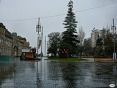 Pavés mouillés de la place