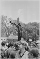 Protester tied to a cross in Washington D.C. (1970)