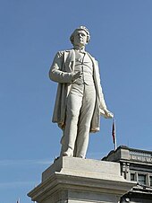 View of stone statue from the ground looking upwards