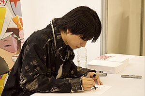 Who-ya Extended signing autograph at Hyper Japan 2024, London.