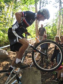 Gilles Coustellier competing at the 2010 UCI Mountain Bike and Trials World Championships in Mont-Sainte-Anne, QC, Canada