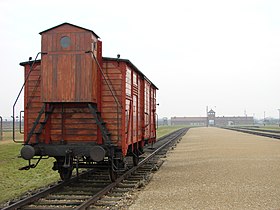 Cattle wagon with brakeman's cabin on Siding near the Auschwitz concentration camp - Oświęcim - Poland.