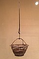 Ryūrikyō hanging flower basket. Smoked dwarf bamboo and rattan. By Tanabe Chikuunsai I, late Meiji–early Taishō period, c. 1900–1920